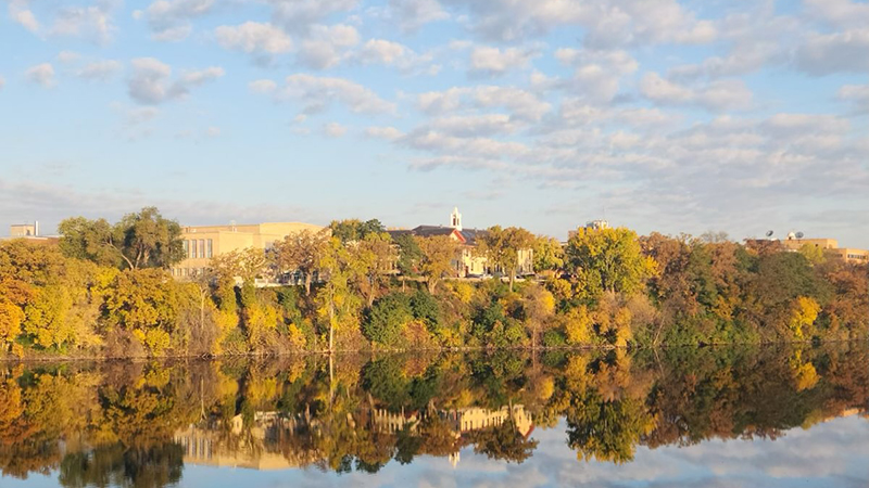 Popcorn clouds and blue sky over campus