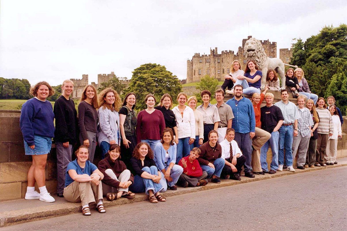 Class photo in front of castle