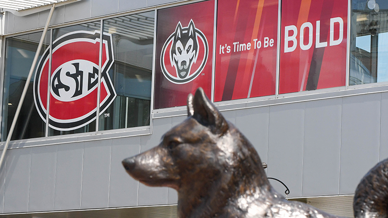 Husky statue with St. C in background