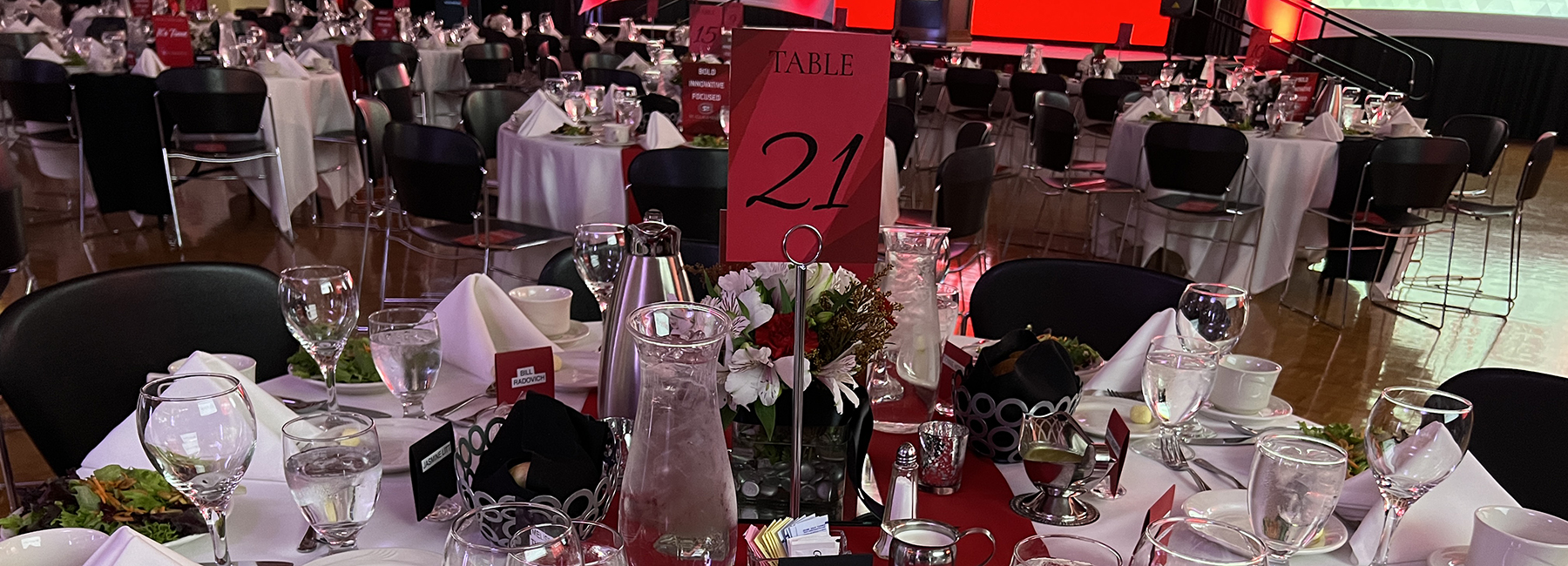 Table setting at event in ballroom