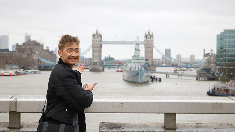 Student showing off Tower Bridge in London