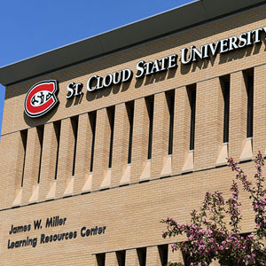 an exterior view of the Miller Center library on a sunny day