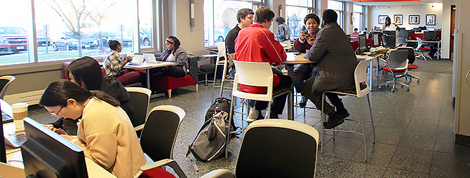 students visiting with each other in the coffee shop