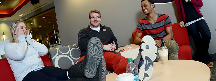 students having a discussion in a lounge