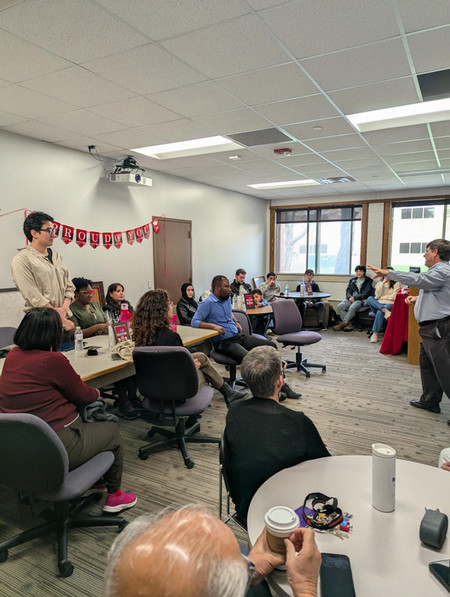 International students with the Intensive English Center listen to the director at end of year celebration