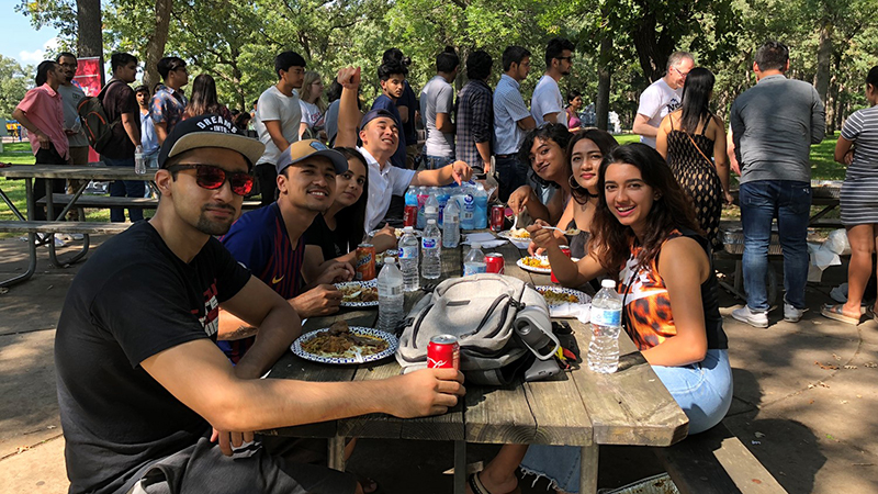 Nepal students at an outdoor picnic