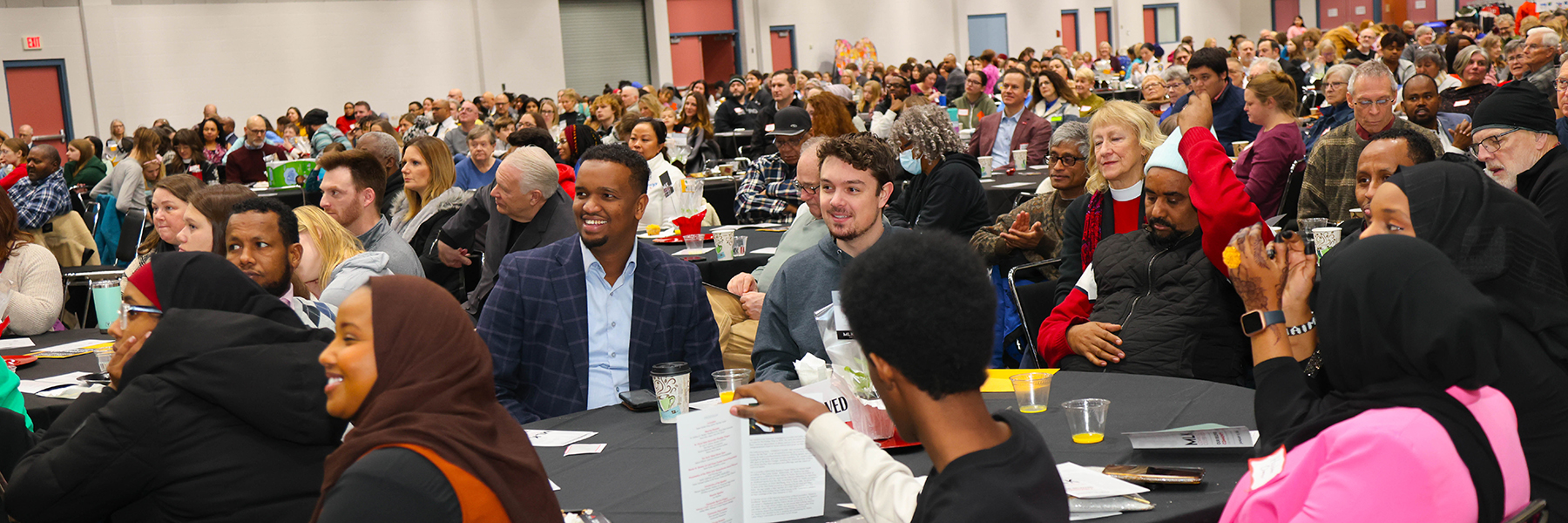 Seated crowd at breakfast event