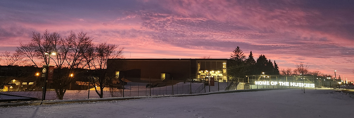 Athletics buildings with purple sunset in sky