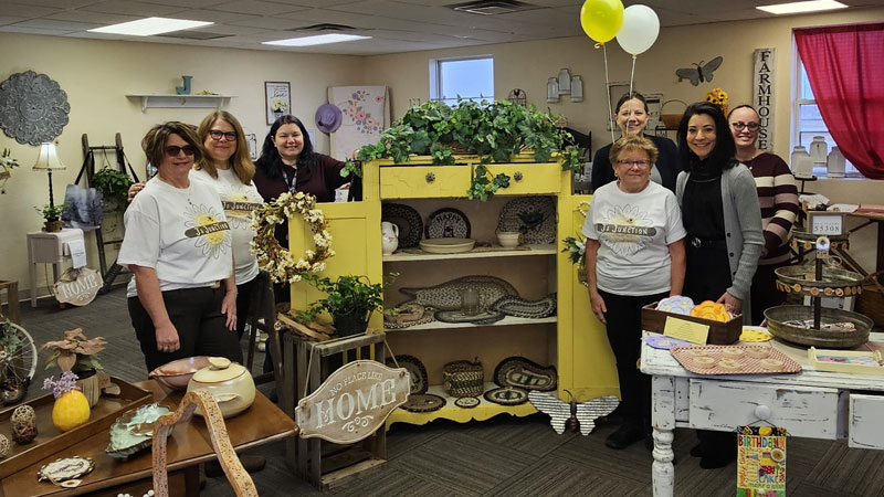 Six women in a home decor store