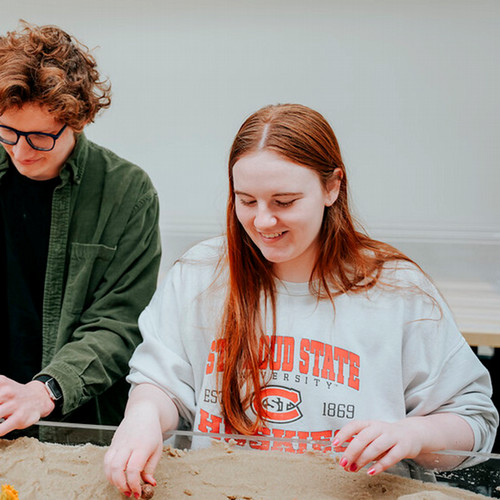 Eryn Bloom smiles while working in the Hydrology lab